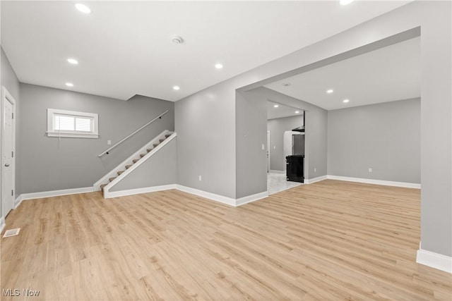 basement with light wood-type flooring