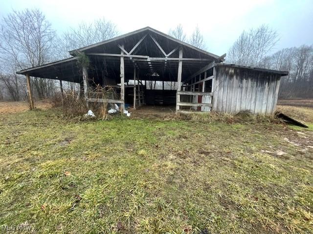 exterior space with an outbuilding