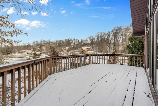 view of snow covered deck