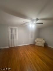 empty room with hardwood / wood-style flooring