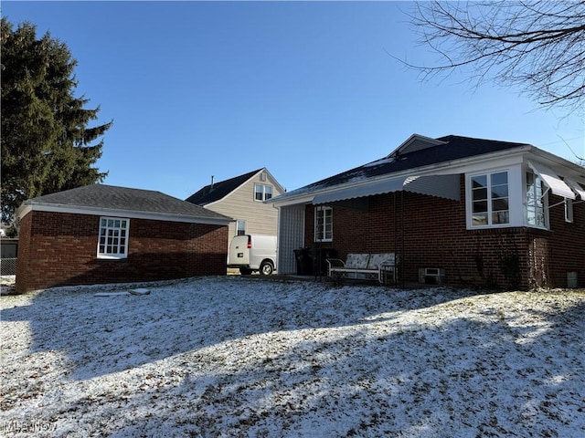 view of snow covered property