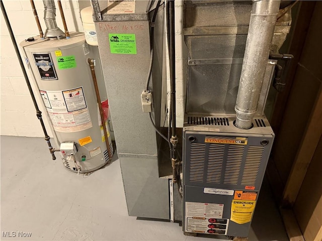 utility room featuring water heater and heating unit