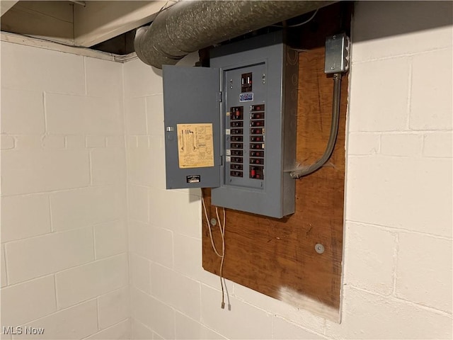 utility room featuring electric panel