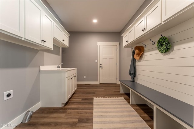 mudroom with dark wood-type flooring and sink