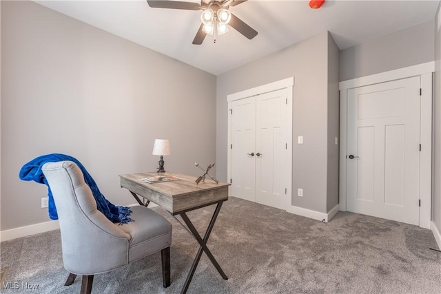 office with ceiling fan and carpet floors