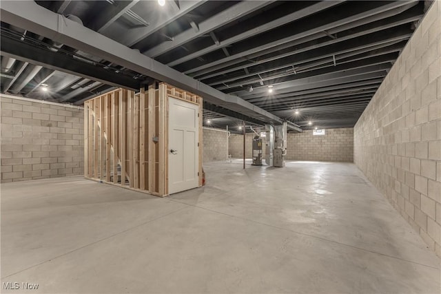 basement featuring water heater