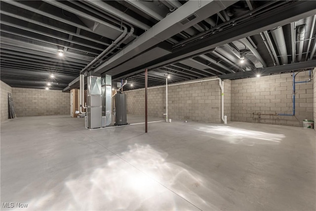 basement with heating unit and water heater