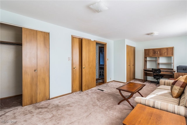 living room featuring light carpet