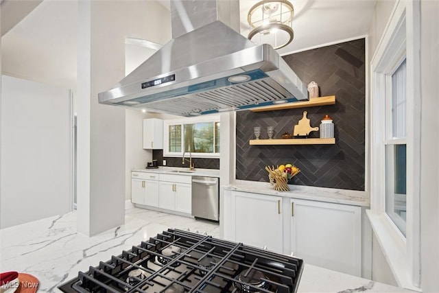 kitchen featuring ventilation hood, stainless steel dishwasher, white cabinetry, and tasteful backsplash