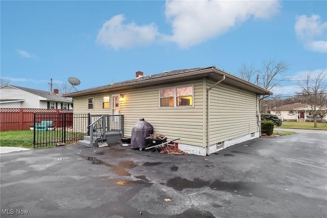 back of house featuring a patio area