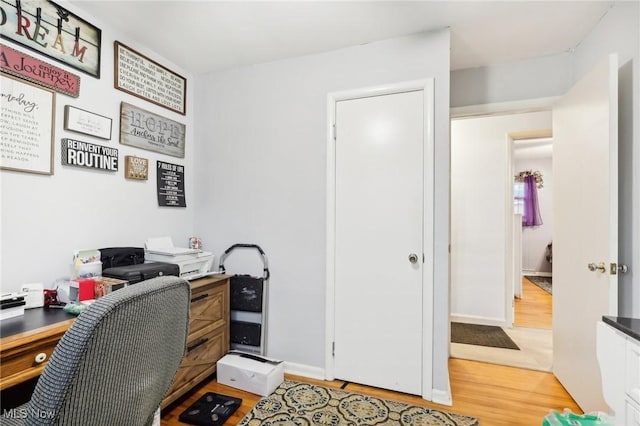 home office featuring light wood-type flooring