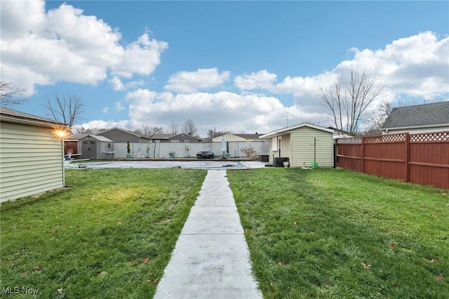 view of yard with a storage shed