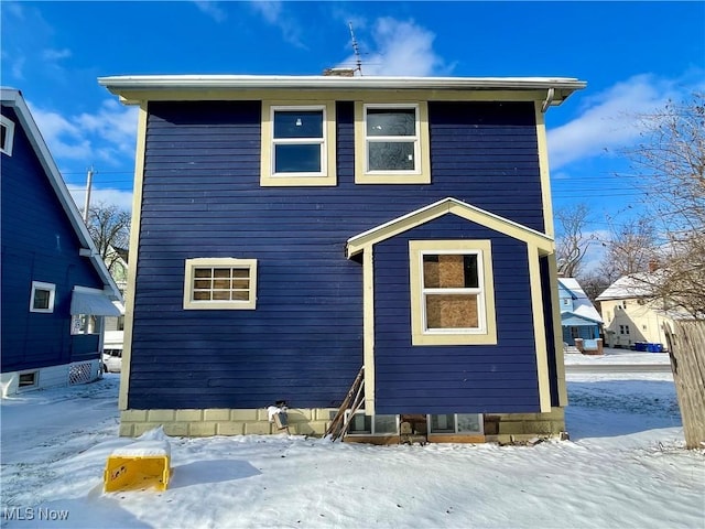 view of snow covered property