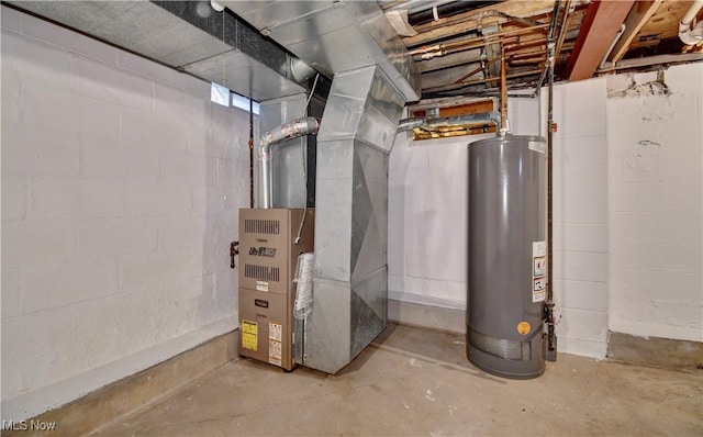 utility room featuring heating unit and gas water heater