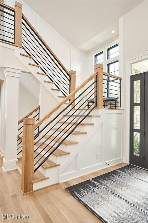 2847 Rocky Ridge Dr, Westlake, OH 44145 - foyer with wood finished floors, stairs, and recessed lighting
