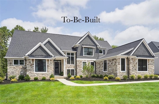 2847 Rocky Ridge Dr, Westlake, OH 44145 - craftsman-style home with a front yard, stone siding, and a shingled roof
