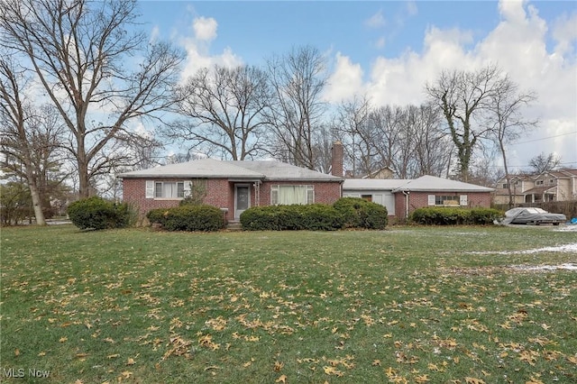 1956 Bluff Ave, Columbus, OH 43212 - single story home featuring brick siding, a chimney, and a front yard