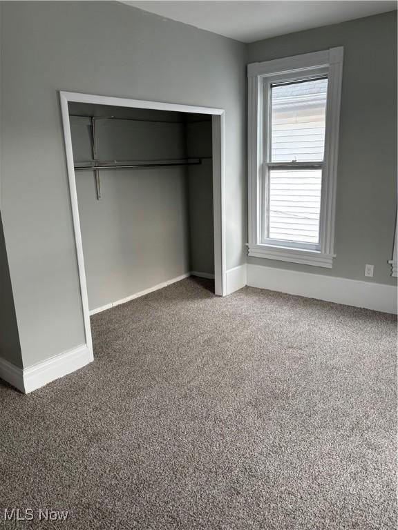 934 Main St, Wellsville, OH 43968 - unfurnished bedroom with carpet flooring and a closet