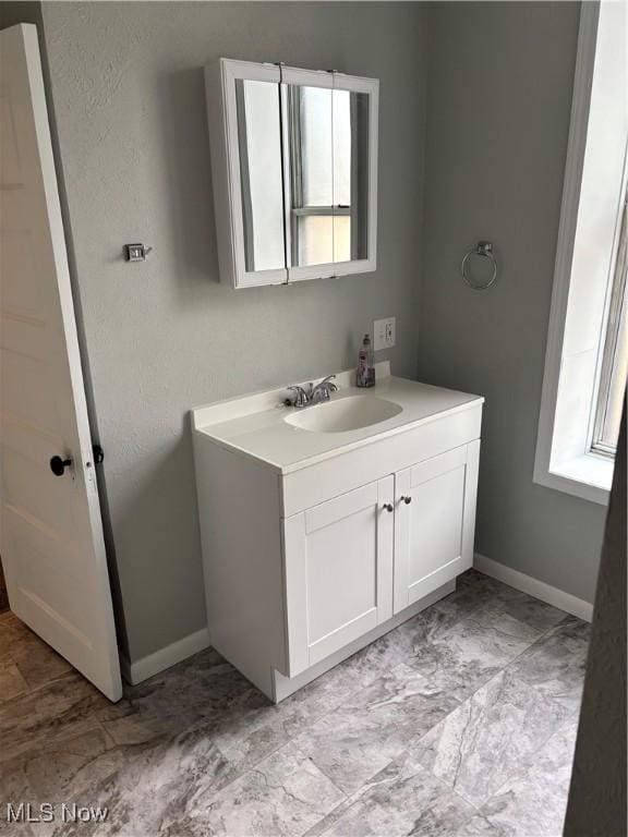 934 Main St, Wellsville, OH 43968 - bathroom with vanity and plenty of natural light