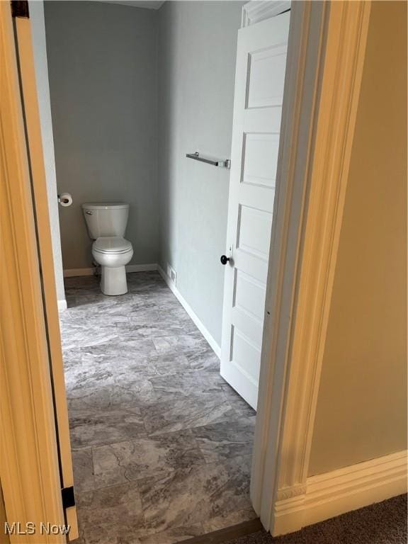 934 Main St, Wellsville, OH 43968 - bathroom with toilet and baseboards