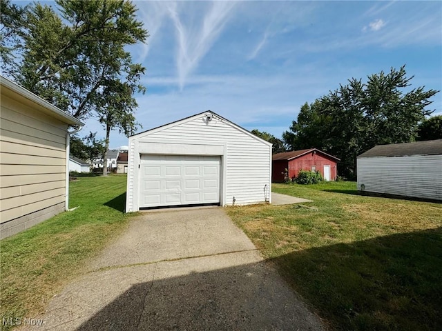 garage featuring a yard