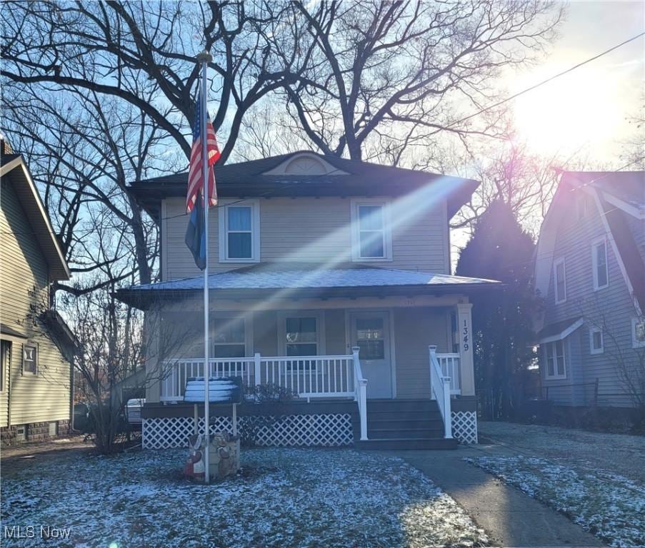 view of front of home featuring covered porch