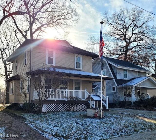 front facade featuring covered porch