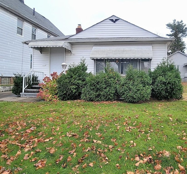 exterior space with a front yard