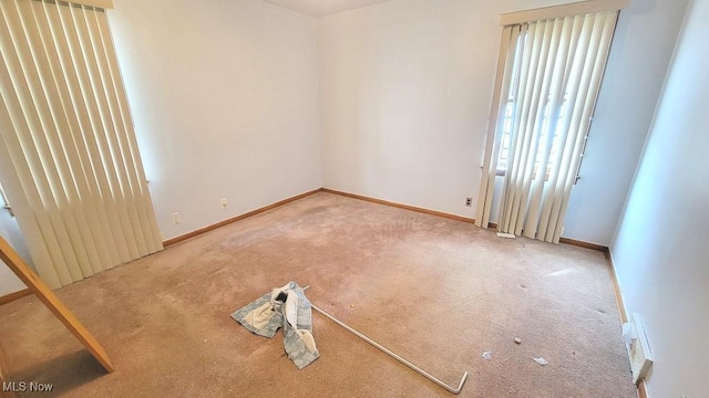 view of carpeted spare room