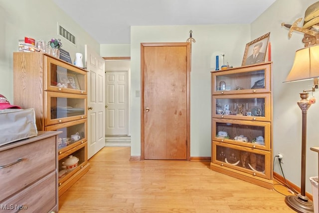 miscellaneous room with light wood-type flooring