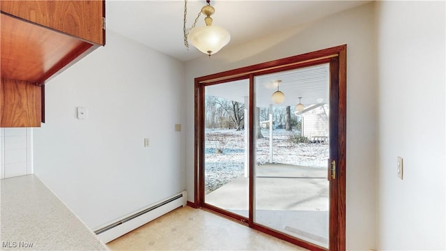 entryway with a baseboard radiator