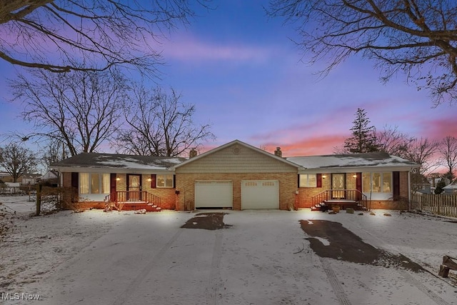 single story home with a garage