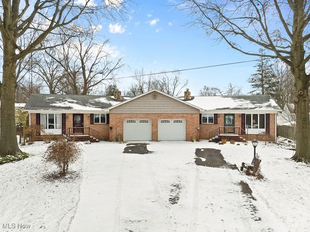 single story home with a garage