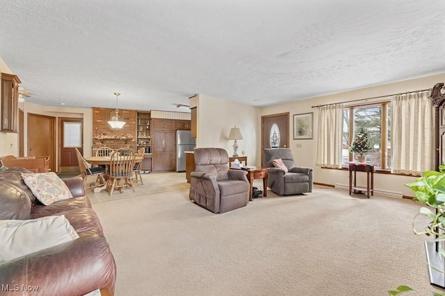 carpeted living room with a textured ceiling