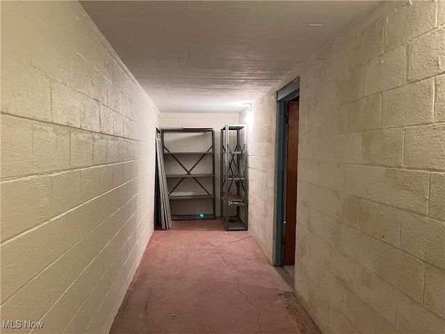 hall with concrete floors