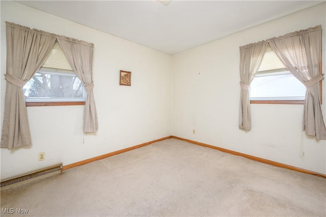 empty room featuring carpet flooring