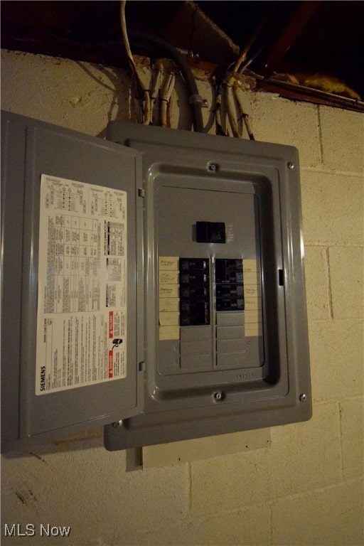 utility room with electric panel