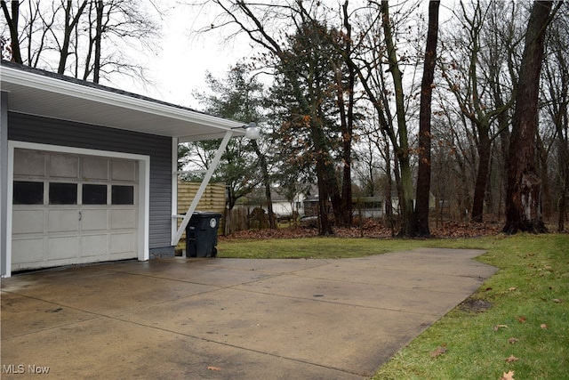 garage featuring driveway