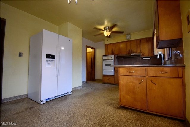 kitchen with ceiling fan, sink, and white appliances