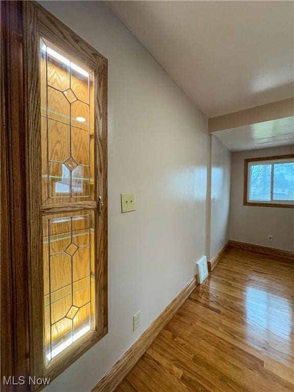 spare room with light wood-type flooring