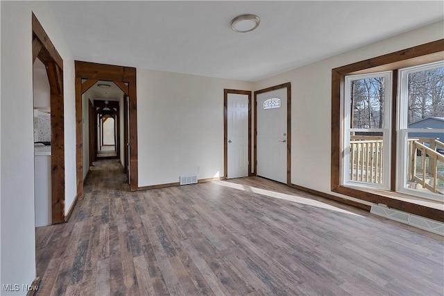 unfurnished room featuring hardwood / wood-style flooring