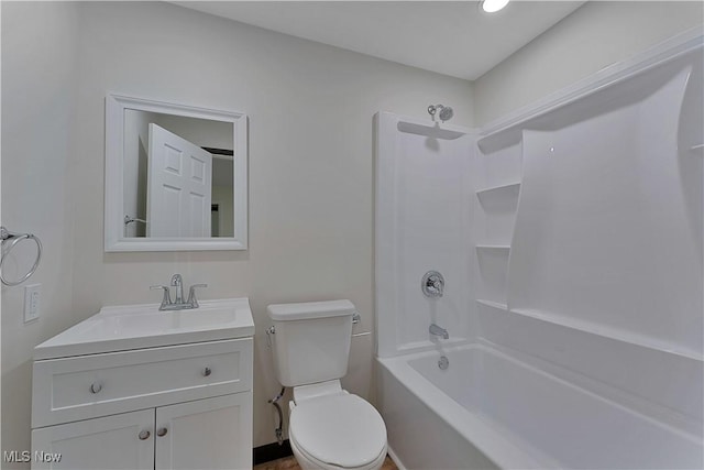 full bathroom with vanity, bathing tub / shower combination, and toilet