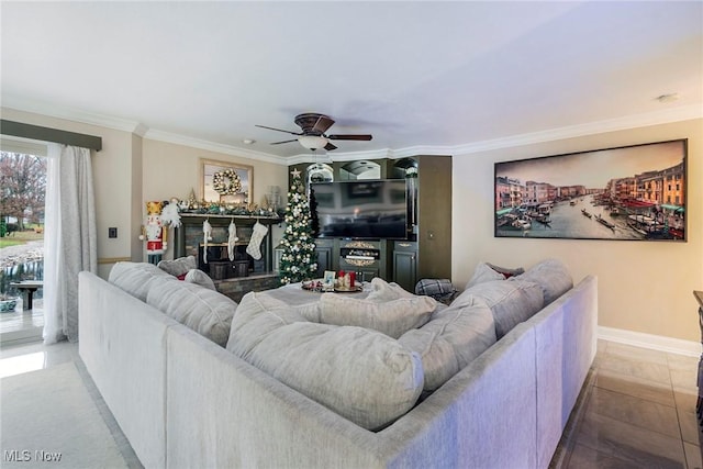 tiled living room featuring ceiling fan and ornamental molding