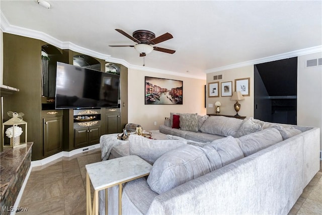 living room with visible vents, ornamental molding, and a ceiling fan