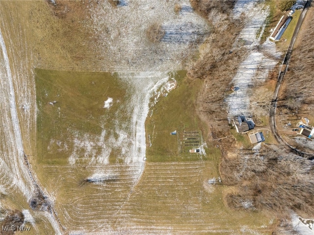 birds eye view of property featuring a rural view