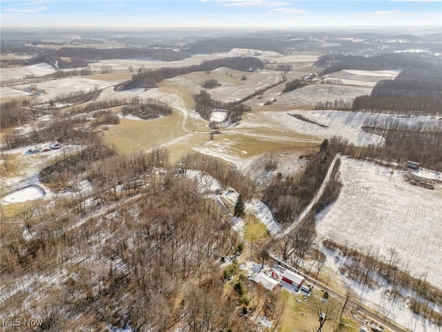 snowy aerial view with a rural view