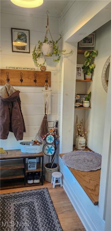 mudroom with wood finished floors