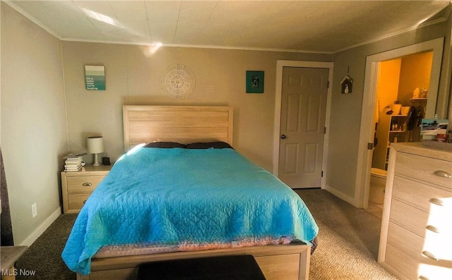 carpeted bedroom with baseboards and ornamental molding