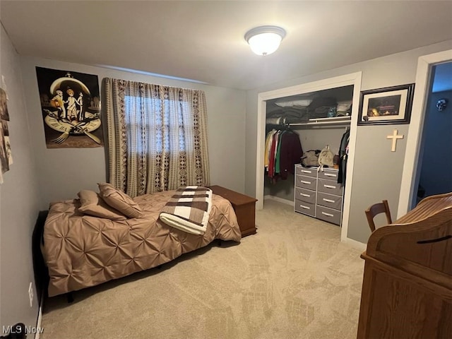 carpeted bedroom featuring a closet