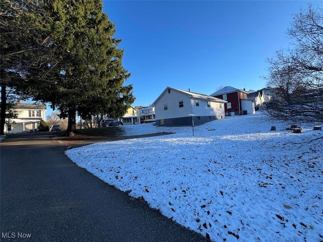 view of yard covered in snow